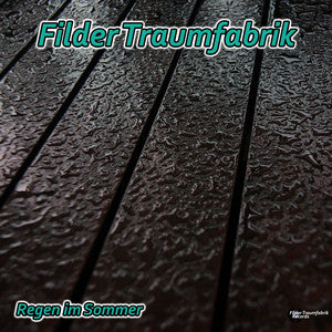 Bunter Regen im Sommer, Filder Traumfabrik, zeigt Regentropfen auf hellem Himmel mit bunten Regenschirmen im Hintergrund
